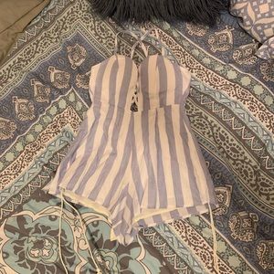 Brand New Flirty Romper with Lace-Up Back